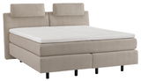 Beiges Boxspringbett mit zwei Kopfstützen, seitliche Perspektive