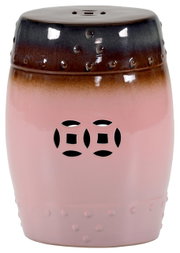Keramische tuinkruk/bijzettafel in roze met bruin kleurverloop, glanzend glazuur, noppenstructuur en decoratieve uitsparingen, productfoto van voren, licht van bovenaf