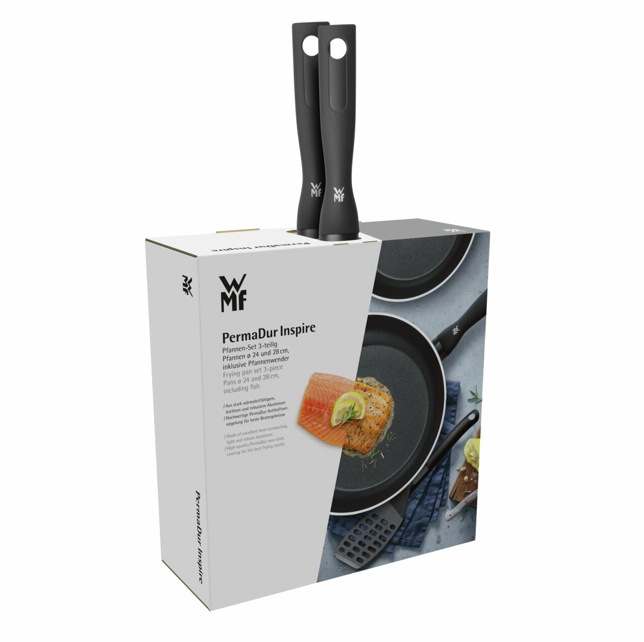 Verpackung des WMF PermaDur Inspire Pfannensets mit zwei Pfannen und einem Wender, perspektivisch von vorne rechts fotografiert.