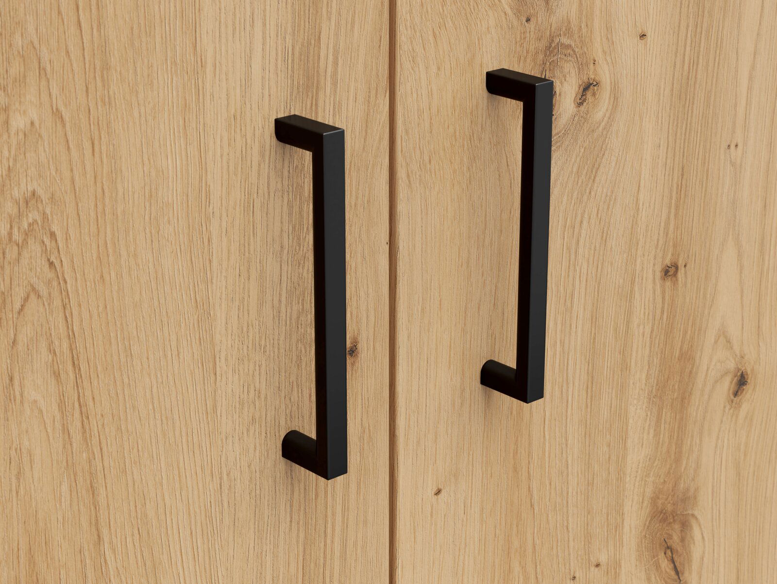 Carryhome Kommode MULTISTAURAUM Nahaufnahme von zwei schwarzen Griffen auf einer Holzkommode, frontale Perspektive