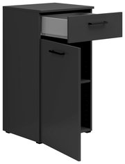 Schwarze Kommode mit einer offenen Schublade und einer offenen Tür, seitliche Perspektive