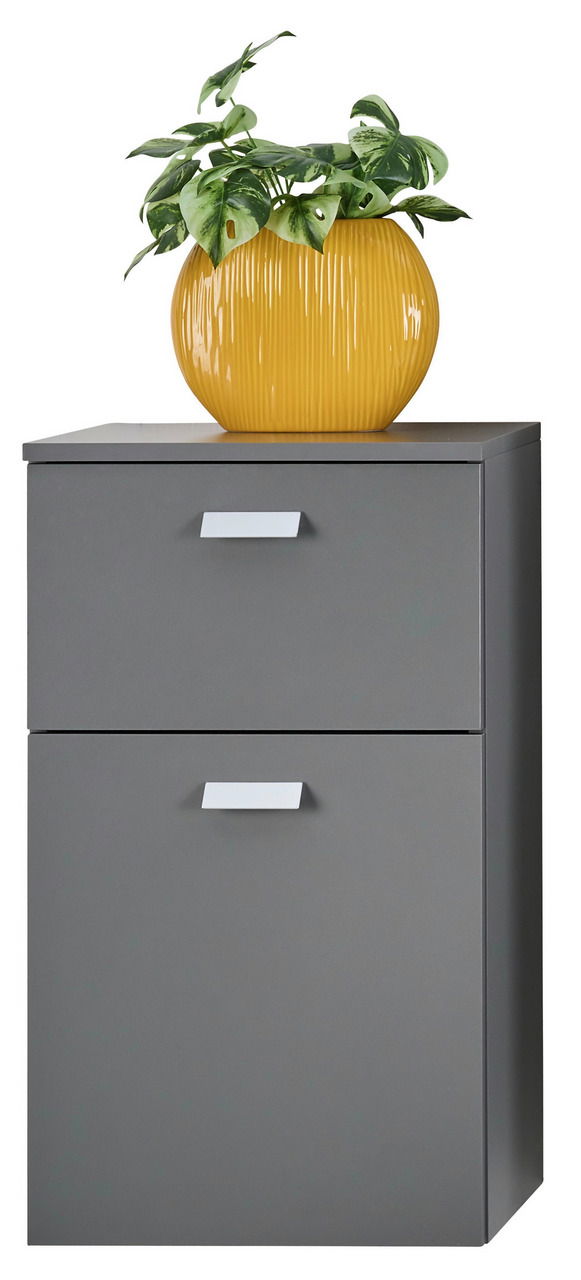 Grauer Unterschrank mit zwei Schubladen, darauf eine gelbe Vase mit grüner Pflanze, Frontalansicht.
