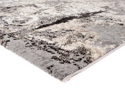 Designer Teppich in Grau- und Beigetönen mit abstraktem Muster, seitliche Perspektive