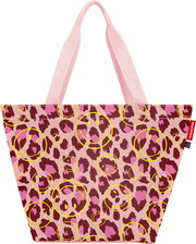 Rosa Shopper-Tasche mit Leopardenmuster und gelben Smiley-Kreisen, breite Tragehenkel, Frontansicht vor weißem Hintergrund