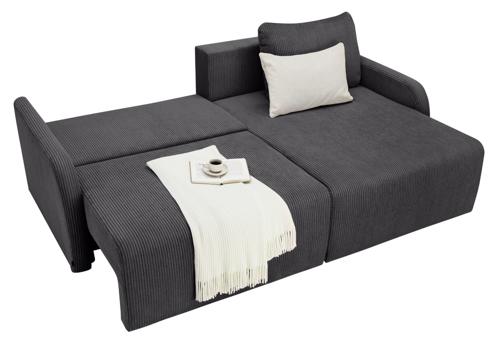 Graues Ecksofa mit ausziehbarer Liegefläche, dekoriert mit einem weißen Kissen und einer weißen Decke, aus der Vogelperspektive.