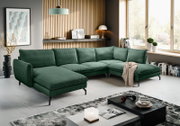 Grünes L-förmiges Ecksofa mit Cordbezug und schwarzen Metallfüßen in modernem Wohnzimmer, Perspektive: frontale 3/4-Ansicht von leicht links.