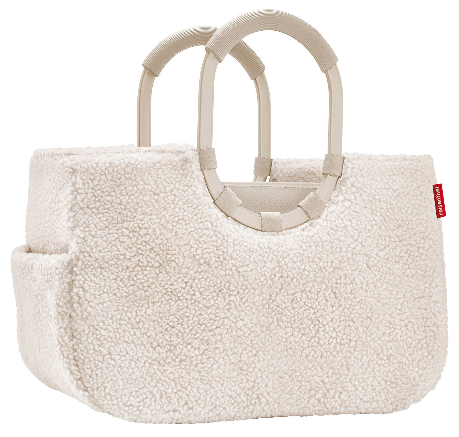 Loopshopper M in cremefarbener Schaffelloptik mit zwei stabilen Griffen, Seitenansicht.