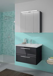 Moderner Badblock mit Waschbecken und Unterschrank in einer stilvollen Badezimmerumgebung, seitliche Perspektive.