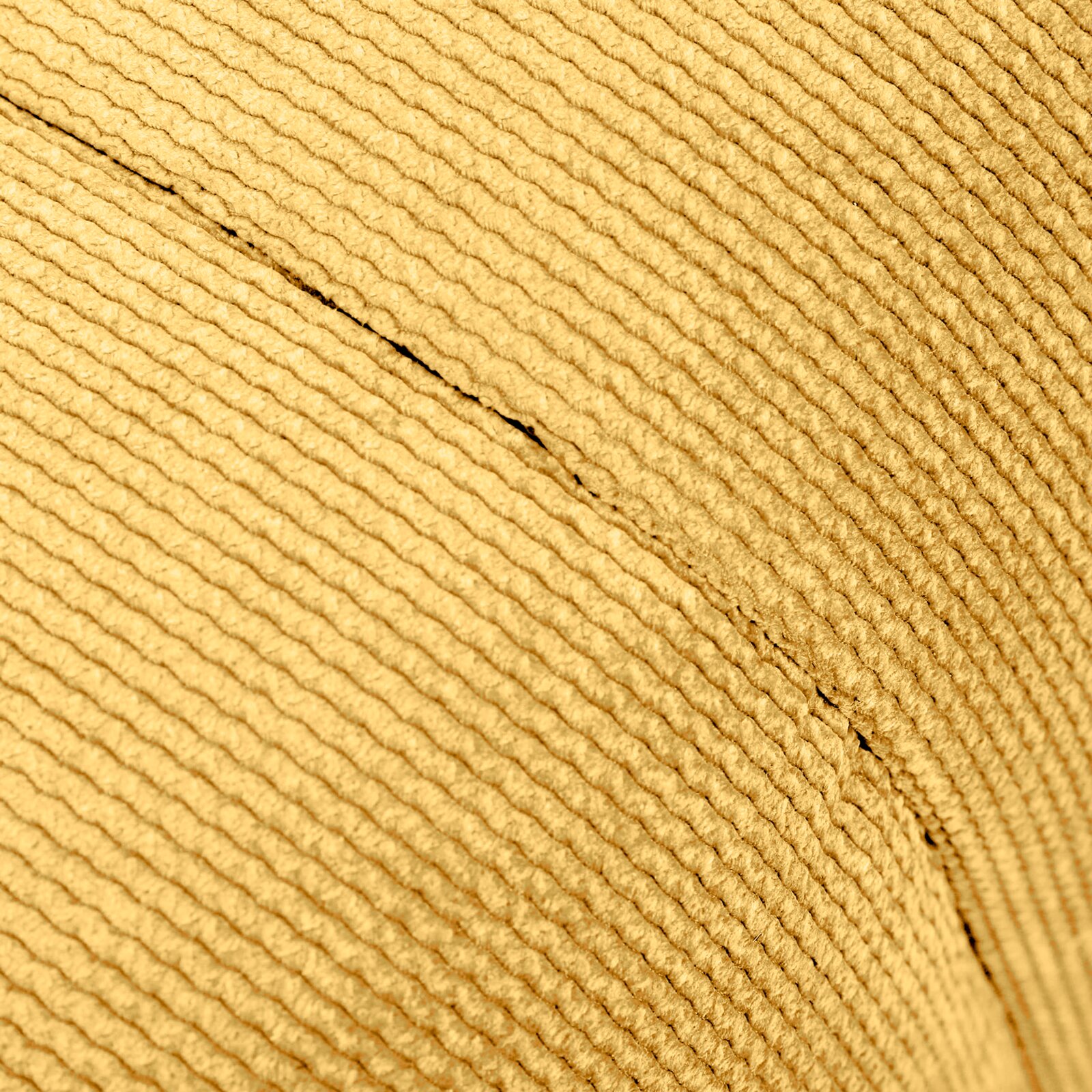 Nahaufnahme des Stoffes eines Hockers mit gerippter Textur in beige, seitliche Perspektive