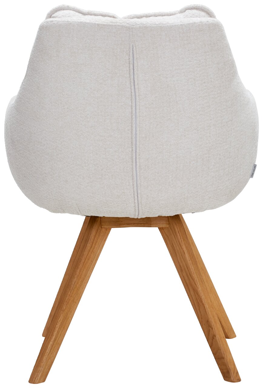 Rückansicht eines Armlehnstuhls mit hellem Stoffbezug und Holzbeinen.