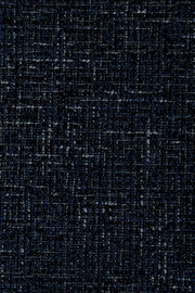 Close-up van een donkerblauw stoffenpatroon met een gestructureerd weefpatroon
