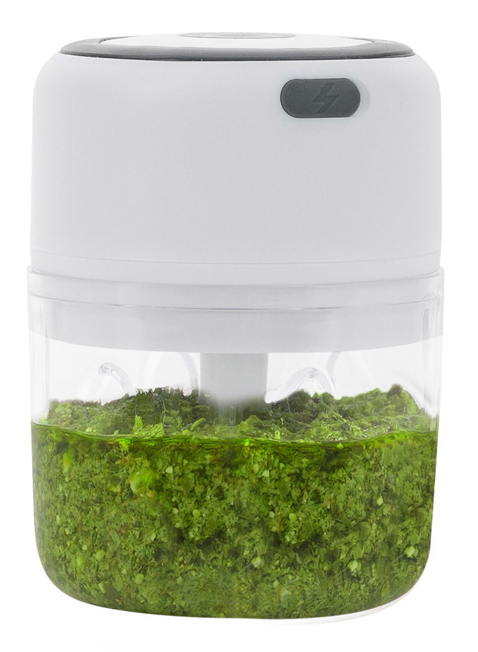 Elektrischer Zerkleinerer Choptastic 2 pro, seitliche Ansicht, gefüllt mit gehackten grünen Kräutern.