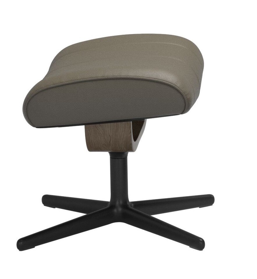 Seitenansicht eines modernen Stressless Hockers PAUL mit schwarzem Metallfuß und gepolsterter Sitzfläche in neutralem Farbton.