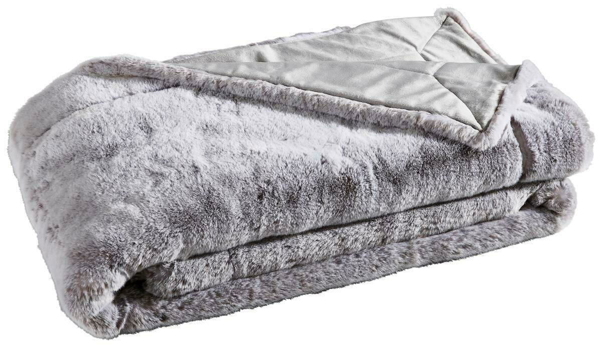 Ambiente Felldecke SILBERFUCHS Luxuriöse Felldecke in Silberfuchs-Optik, gefaltet und von der Seite betrachtet.