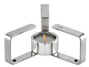 Modernes Stövchen aus Edelstahl mit brennendem Teelicht, seitliche Perspektive