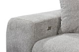 Graue Sofaecke mit strukturiertem Stoffbezug und integriertem Metallknopf, seitliche Perspektive
