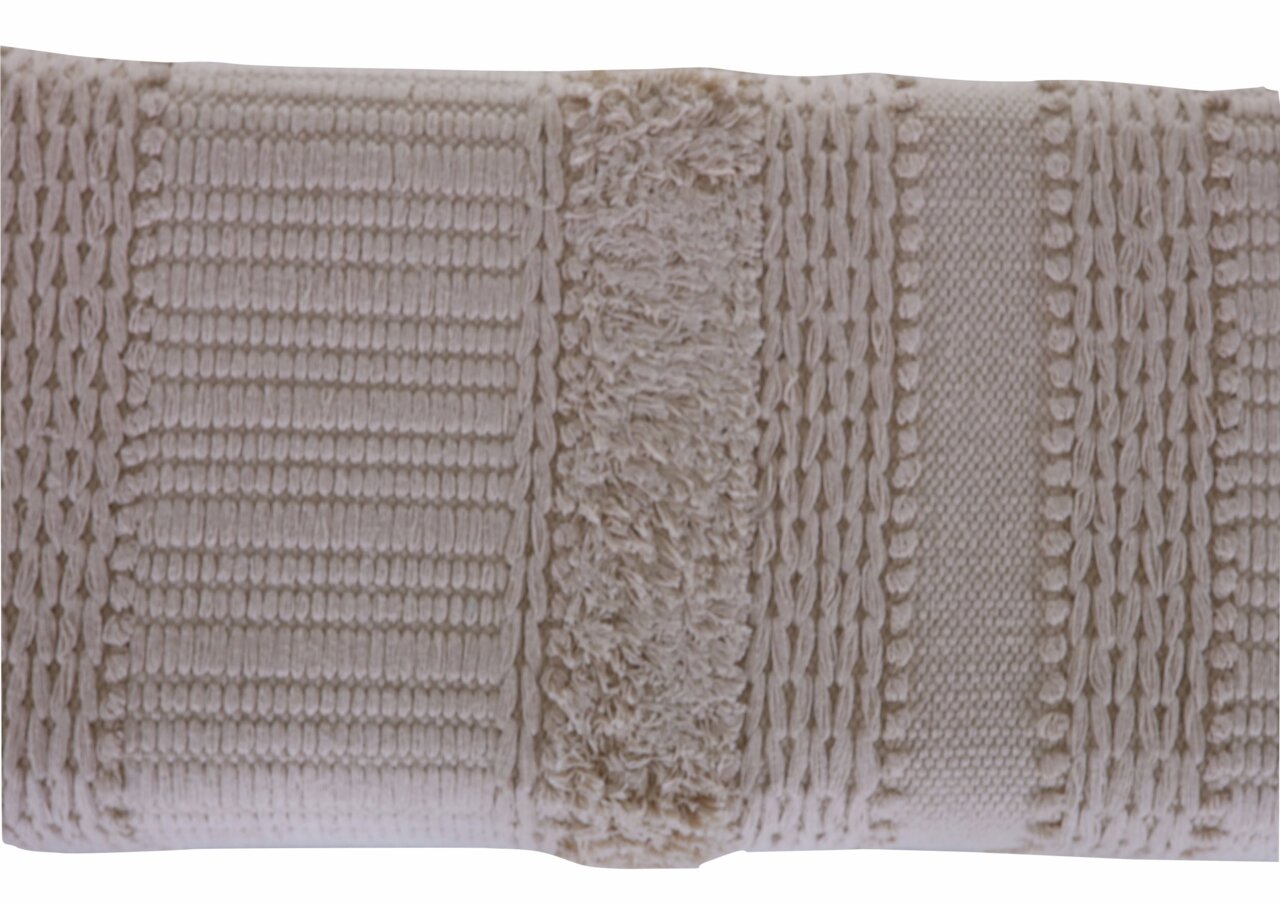 Nahaufnahme einer Hockerbank mit strukturiertem, cremefarbenem Stoffbezug, von oben betrachtet.