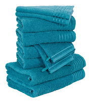 Ein Stapel von türkisfarbenen Handtüchern, seitliche Perspektive