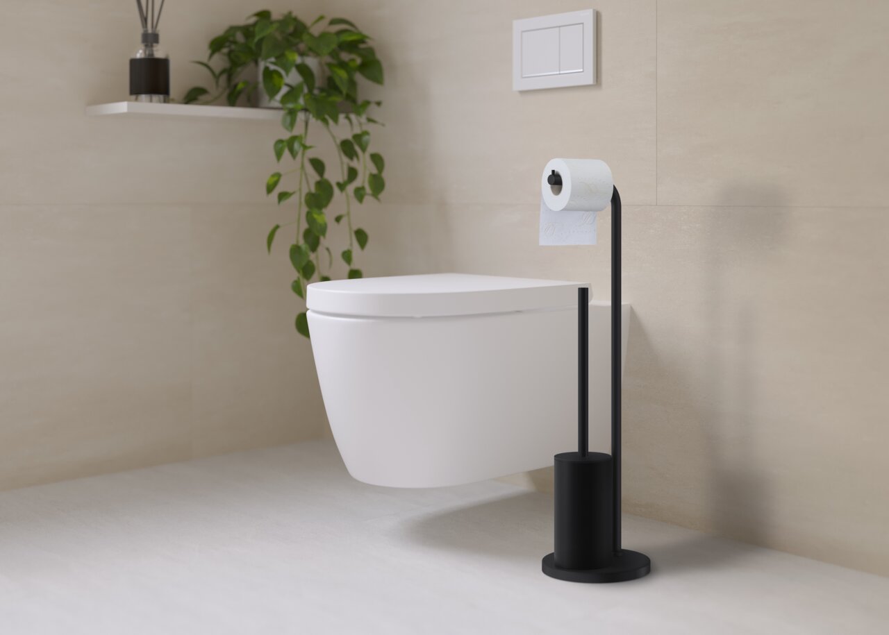 Beslagsboden WC-Garnitur Moderner Toilettenpapierhalter und WC-Bürste in schwarzem Design, seitliche Perspektive im Badezimmer.