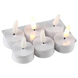 Sechs LED-Teelichter mit 3D-Flamme in einer transparenten Verpackung, Ansicht von oben.