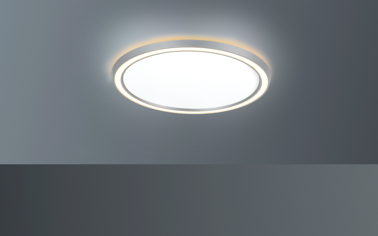 Runde LED-Deckenleuchte mit modernem Design, von unten betrachtet.