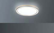 Runde LED-Deckenleuchte mit modernem Design, von unten betrachtet.