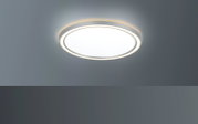 Ronde led-plafondlamp met een modern ontwerp, gezien van onderaf.