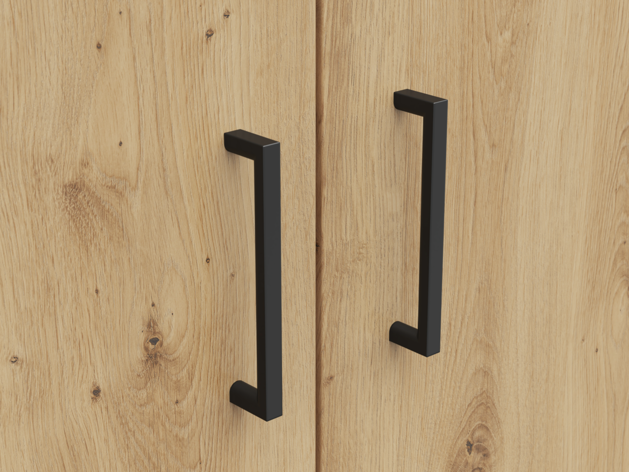Nahaufnahme von zwei schwarzen Griffen an einer Holztür eines Mehrzweckschranks, aus der Frontalperspektive.