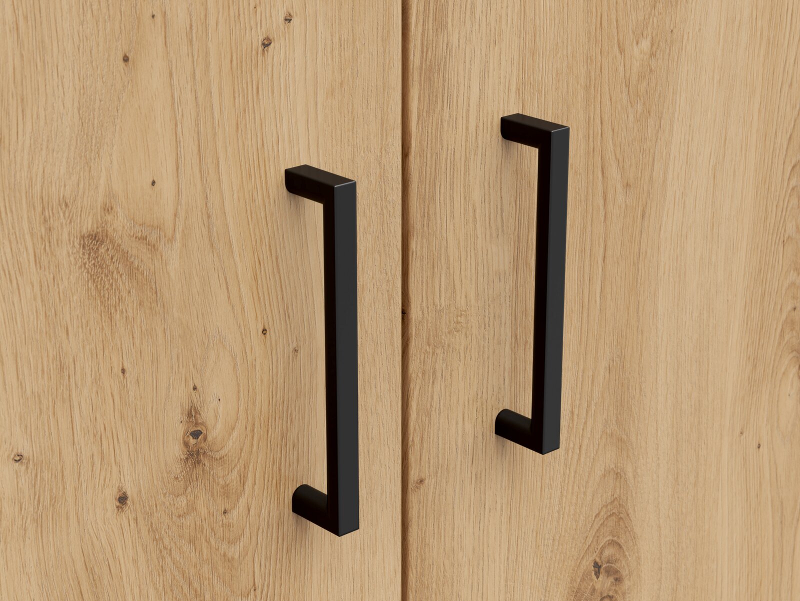 Nahaufnahme von zwei schwarzen Griffen an einer Holztür eines Mehrzweckschranks, aus der Frontalperspektive.