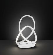 Moderne Tischleuchte INDIGO mit geschwungenem LED-Design, seitliche Perspektive