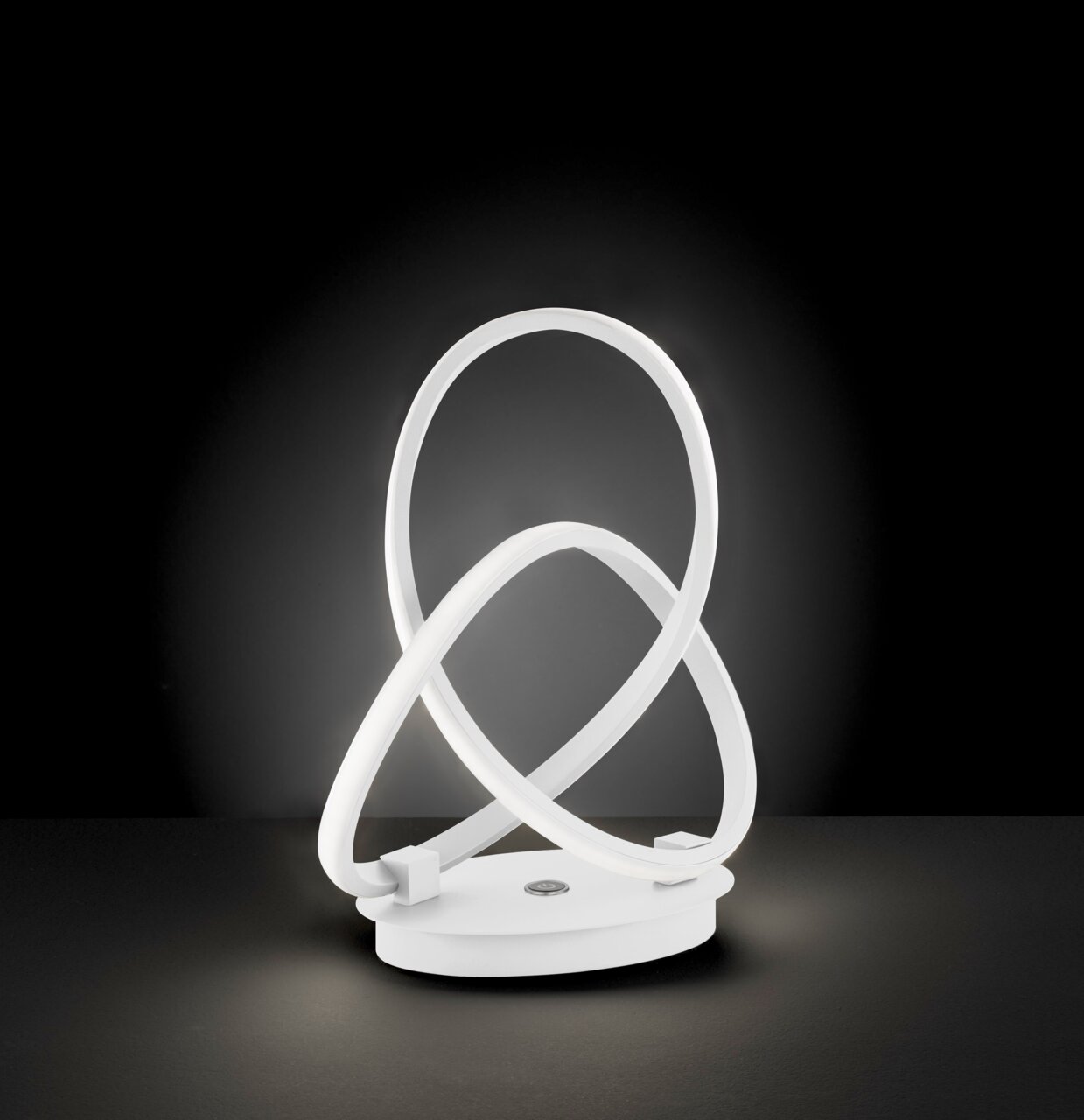 Moderne Tischleuchte INDIGO mit geschwungenem LED-Design, seitliche Perspektive
