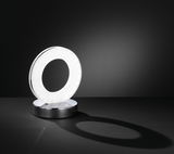Moderne Tischleuchte in Ringform mit seitlicher Perspektive, die ein sanftes Licht abstrahlt.