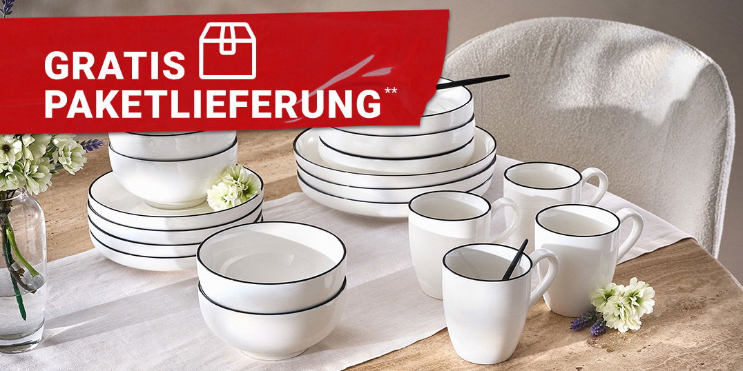 Weißes Geschirr mit schwarzem Rand auf gedecktem Tisch – Gratis Paketlieferung ab 59 Euro Bestellwert