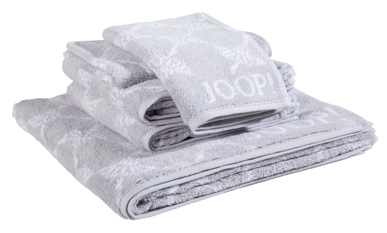 JOOP! Frottierset 5-teilig CORNFLOWER Stapel von grauen Frottierhandtüchern mit eingewebtem Muster und Markenlogo, seitliche Perspektive
