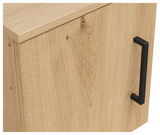 Nahaufnahme eines Aufsatzschranks aus hellem Holz mit schwarzem Griff, seitliche Perspektive