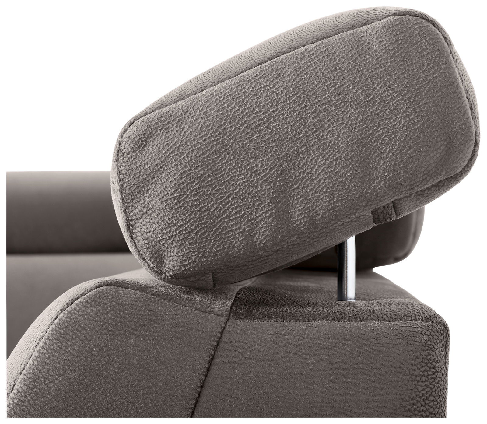 Nahaufnahme einer verstellbaren Kopfstütze eines Sofas in grauem Stoff.