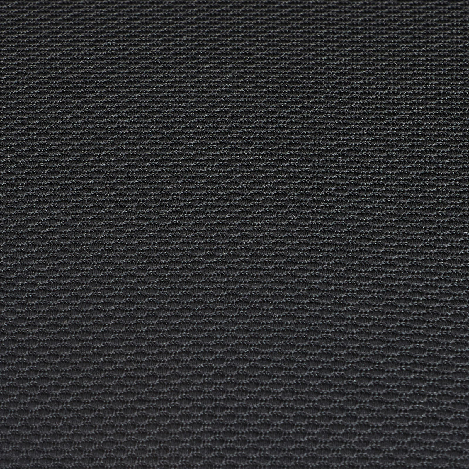 Nahaufnahme eines schwarzen Stoffes mit feiner Textur, Draufsicht