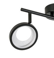 Nahaufnahme eines modernen, schwarzen LED-Strahlers mit rundem Design, seitliche Perspektive