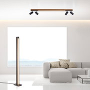 Moderne Stehleuchte PURE-LINES in einem eleganten Wohnzimmer, seitliche Perspektive