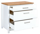 Weißer Schubkastenunterschrank mit drei offenen Schubladen und einer Holzoberfläche, seitliche Perspektive