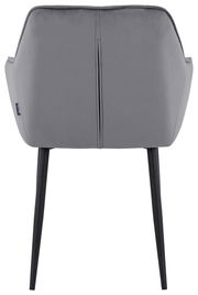 Rückansicht eines grauen Armlehnstuhls mit schwarzen Beinen