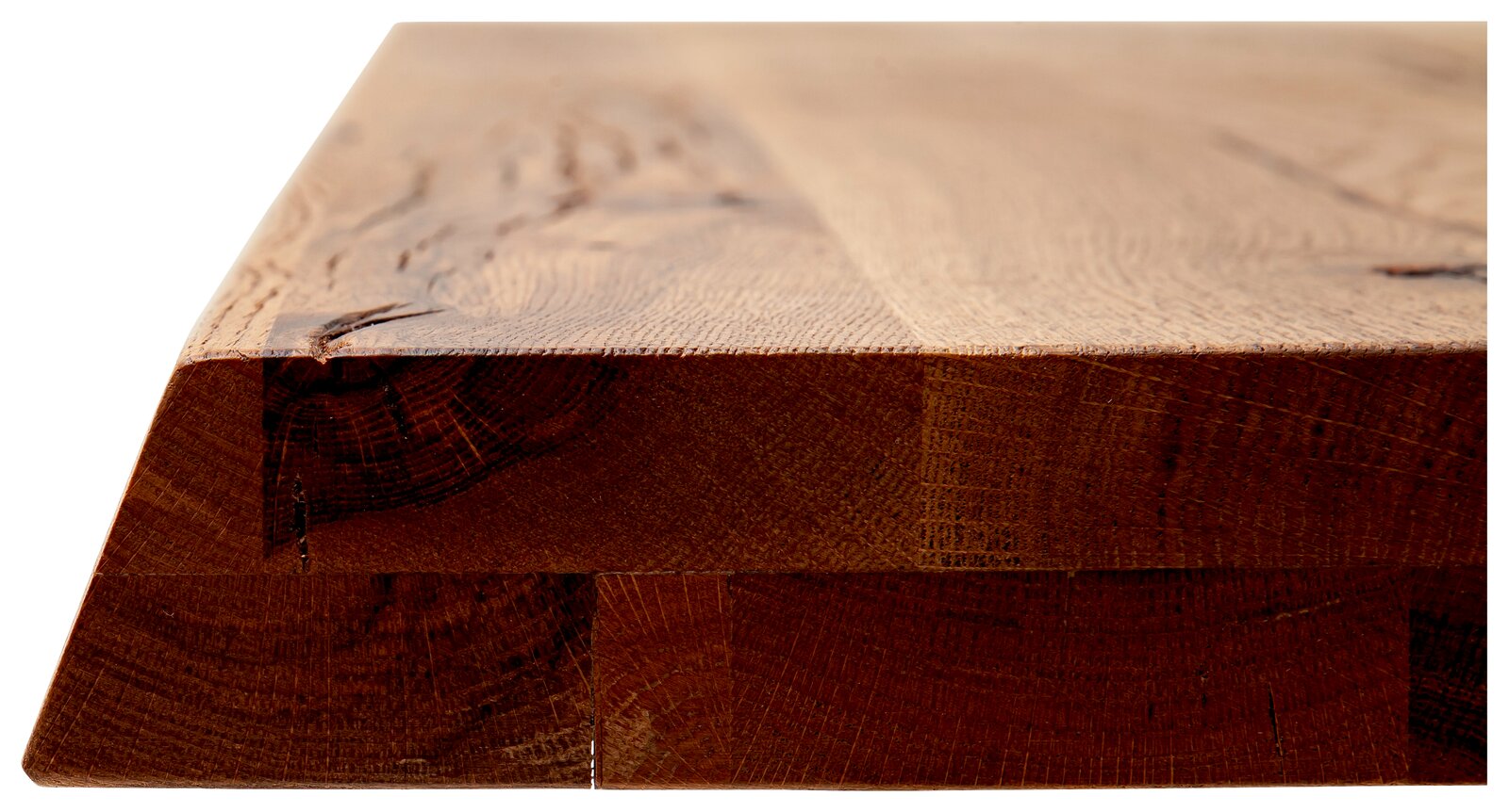 Nahaufnahme einer massiven Holz-Tischplatte aus dunklem Holz, seitliche Perspektive