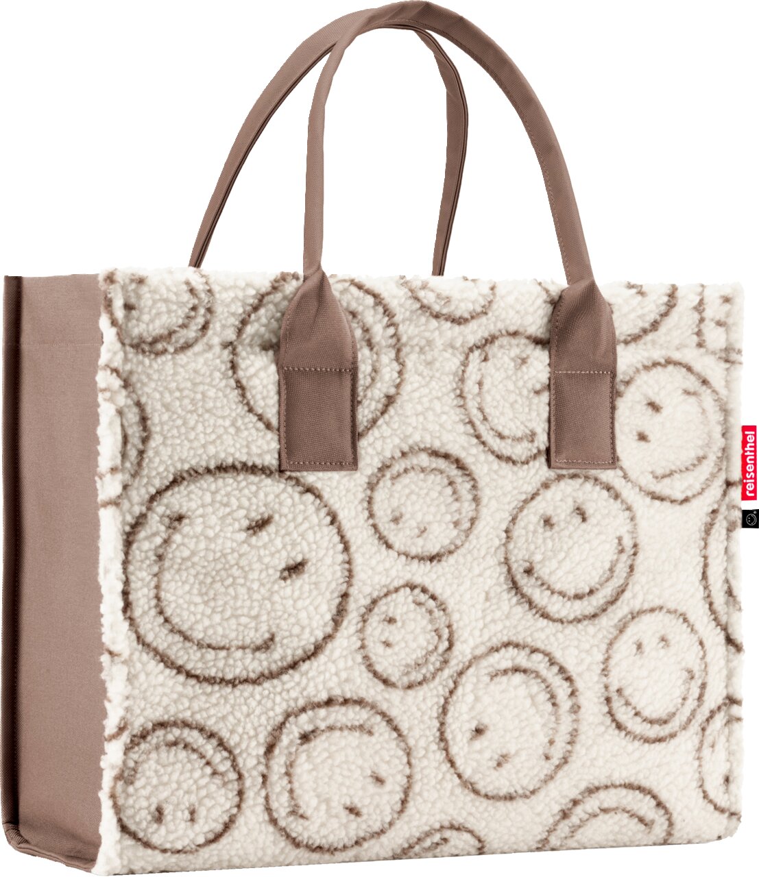 Cremefarbene Shopper-Tasche aus Teddyplüsch mit braunen Smiley-Mustern und zwei braunen Tragehenkeln, frontale Ansicht vor weißem Hintergrund