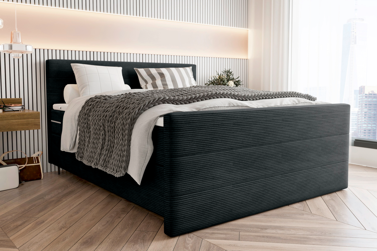 Modernes Boxspringbett in einem stilvollen Schlafzimmer, seitliche Perspektive