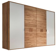 Moderner 4-türiger Kleiderschrank aus Holz mit weißen Akzenten, seitliche Perspektive