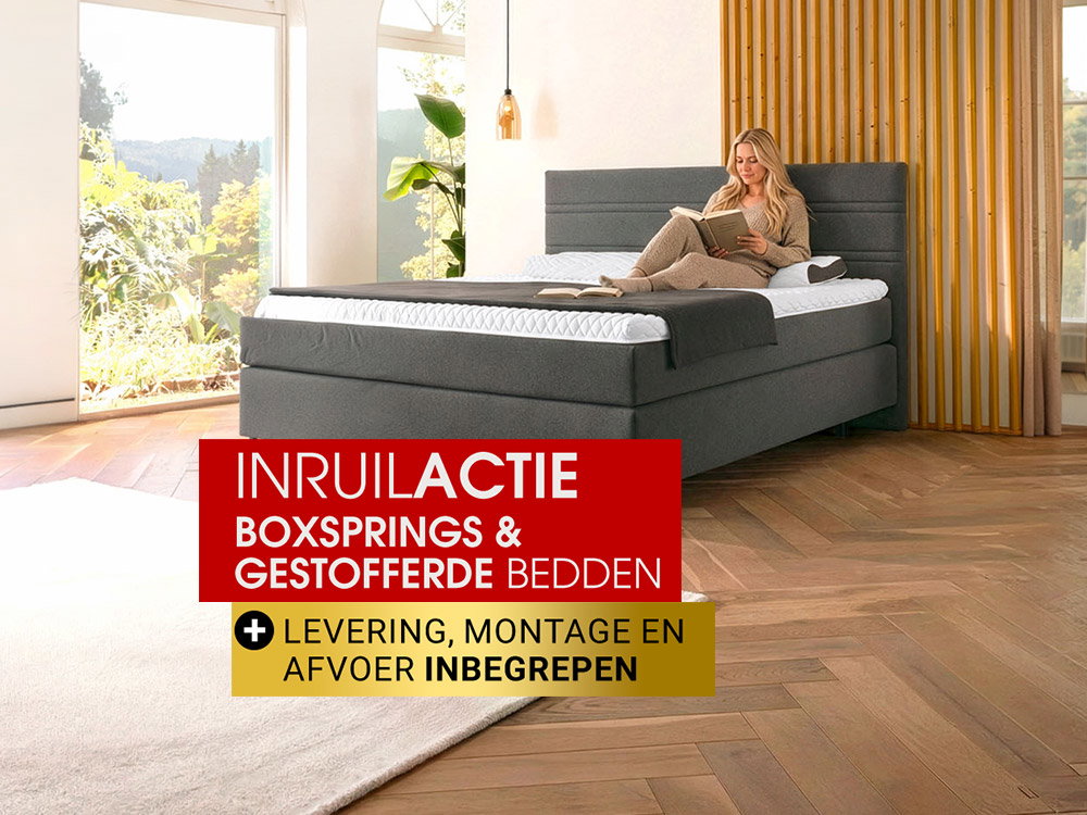 Vrouw leest op boxspringbed in lichte slaapkamer, actie voor boxspring- en gestoffeerde bedden met service