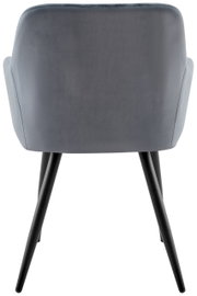 Achterkant van een grijze fauteuil met zwarte poten