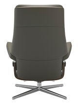 Rückansicht eines modernen Stressless Einzelsessels PAUL mit drehbarem Metallfuß und eleganter Polsterung.