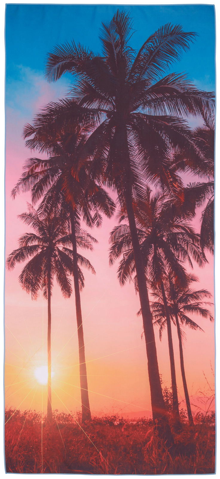 Strandtuch mit Palmenmotiv bei Sonnenuntergang, aus der Vogelperspektive fotografiert.