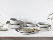 Tellerset 12-tlg aus Keramik mit modernem Design, bestehend aus Schalen und Tellern in einer stilvollen, natürlichen Perspektive.